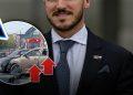 Man in a suit with flag pin; circular inset shows a car crash with ambulances and police, plus a warning sign.